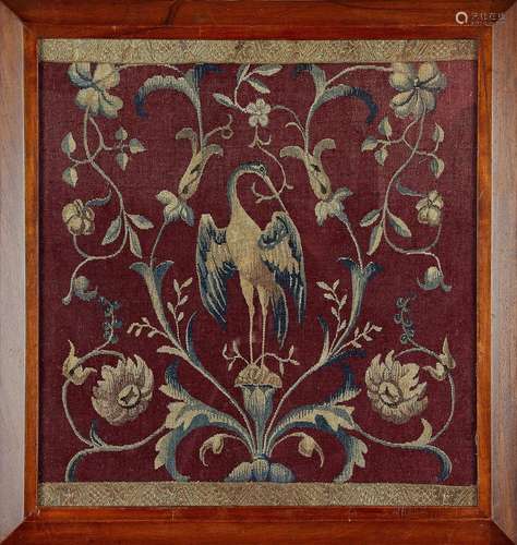 An 18th century needlework panel in a later frame