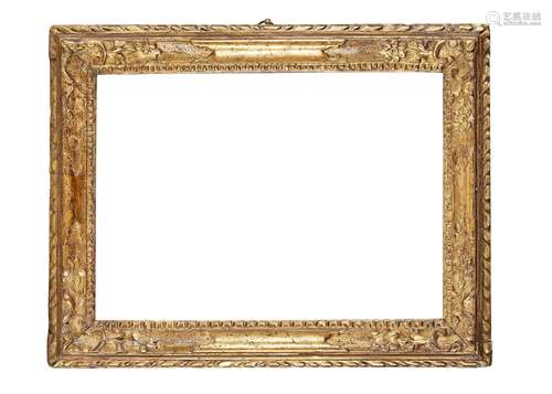 An 18th century carved giltwood rectangular picture frame