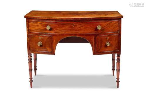 A Regency mahogany bowfront dressing table