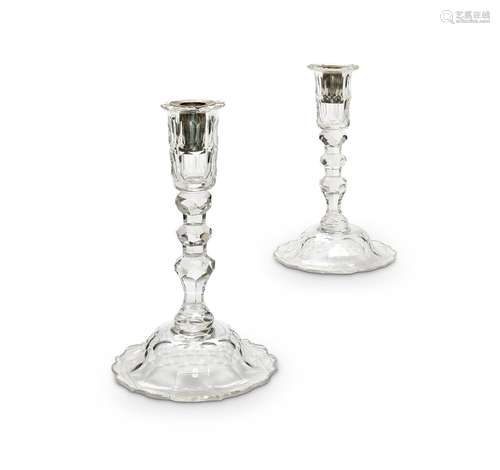 A pair of late 19th century George III style cut glass candl...