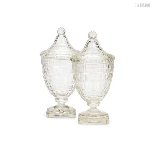 A pair of late 19thc. Regency style campagna vases and a pai...