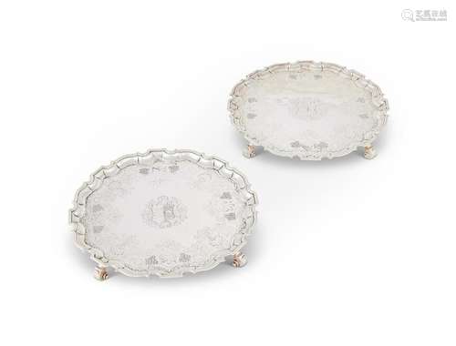 A pair of George II silver salvers by Dennis Langton, London...