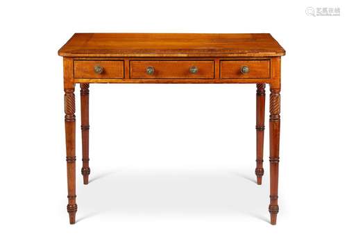 A Regency satinwood and mahogany side table