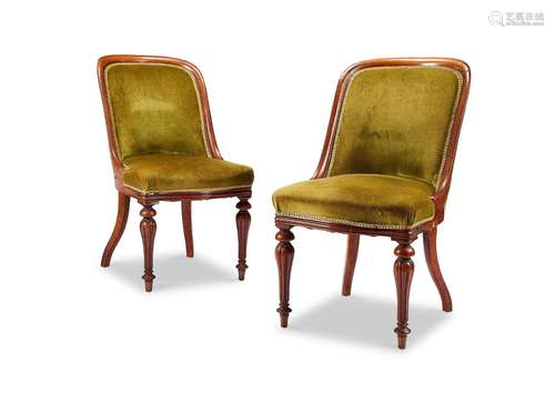 A pair of William IV mahogany scoop back salon chairs in the...