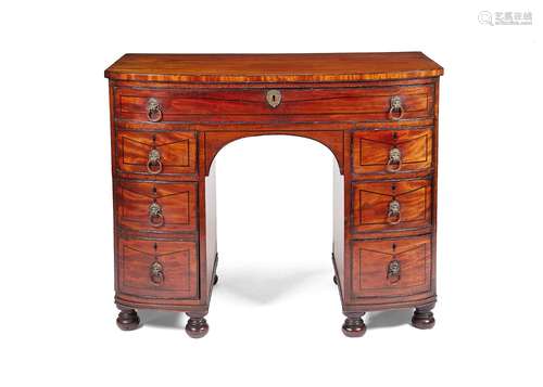 A Regency mahogany bowfront dressing table