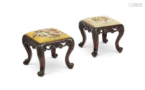 A pair of 19th century carved mahogany rococo revival stools