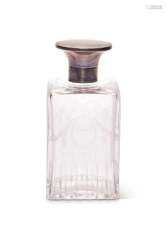 An Edwardian silver topped toilet water bottle