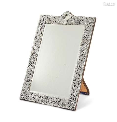 A large late Victorian silver framed dressing table mirror b...