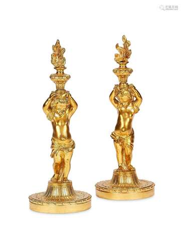 A pair of 19th century French Louis Phillipe gilt bronze tab...