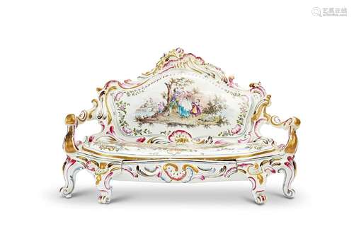 A 19th century Faience miniature settee decorated with scene...