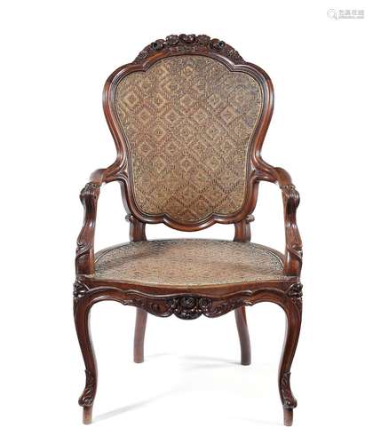 A mid 19th century Chinese export padouk armchair in the Lou...