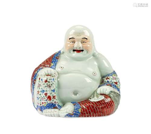 A Chinese polychrome porcelain figure of a seated laughing b...