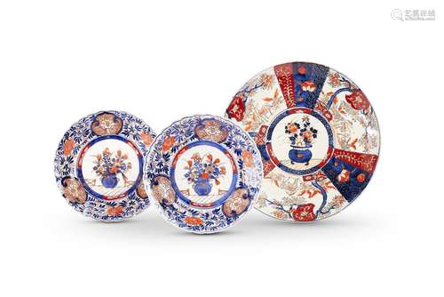 Ten various 19th century Imari dishes and a small charger