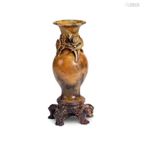 A large early 20th century carved soapstone vase