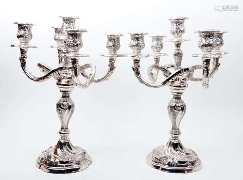 Set richly decorated silver Rococo-style 5-light candlestick...