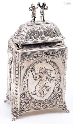 Richly decorated 835/1000 silver tea caddy on legs, h.16 cm.