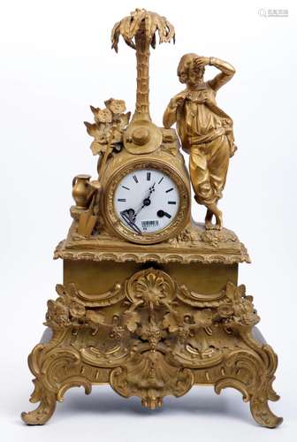 Antique ormolu bronze mantel clock with a man with palm tree...