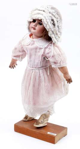 Antique "S.F.B.J. 60 Paris" porcelain doll of a gi...