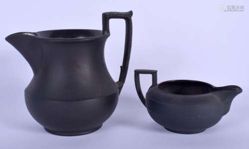 A WEDGWOOD BLACK BASALT CREAM JUG of classical form, togethe...