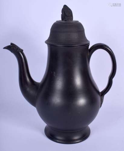 A 19TH CENTURY BLACK BASALT COFFEE POT AND COVER with reeded...