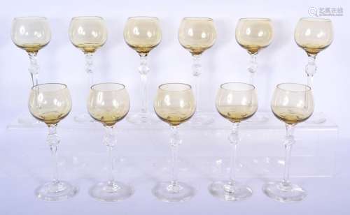 A SET OF ELEVEN STYLISH YELLOW AND CLEAR GLASS WINE GLASSES ...