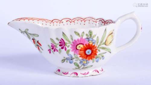 AN 18TH CENTURY BOW PORCELAIN FAMILLE ROSE FLUTED CREAM BOAT...