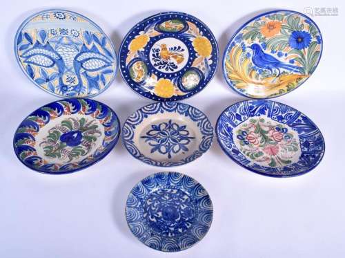 SEVEN LARGE STYLISH SPANISH POTTERY DISHES modelled in the 1...