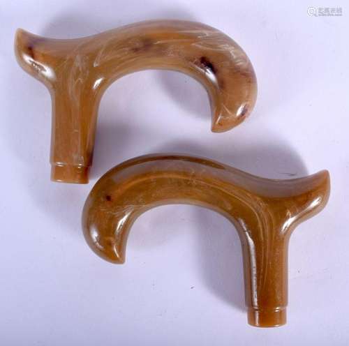 TWO ART DECO BAKELITE CANE HANDLES. 9 cm wide. (2)