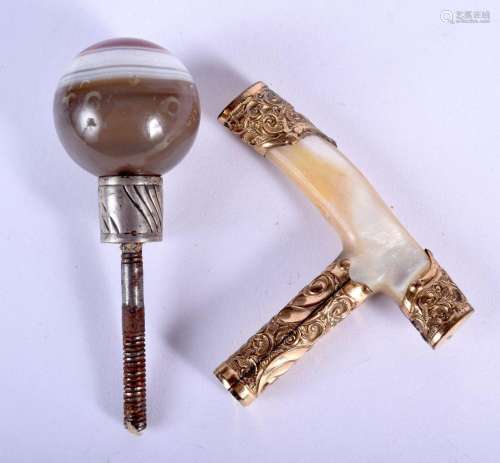 AN 18CT GOLD AND MOTHER OF PEARL CANE HANDLE together with a...