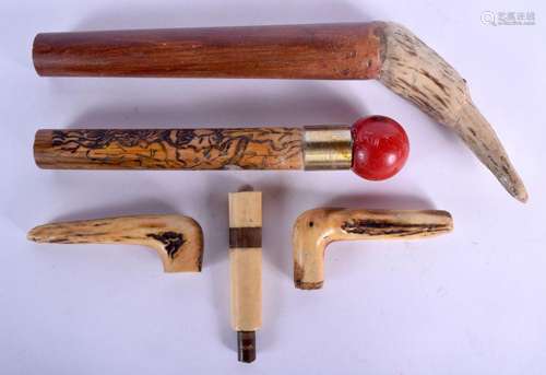 FIVE VINTAGE WALKING CANE HANDLES. Largest 27 cm long. (5)