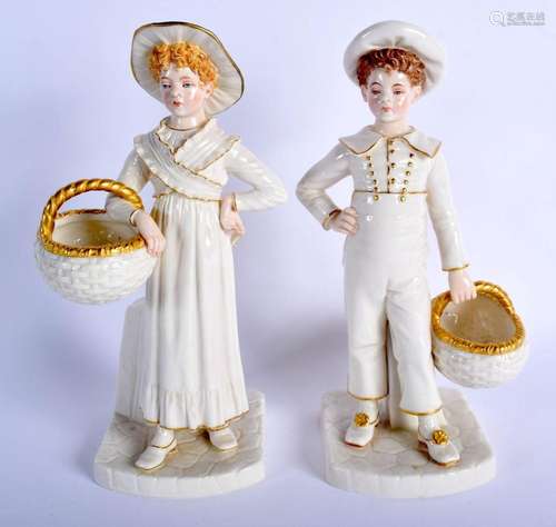 Royal Worcester Hadley style figure of a boy and girl with a...