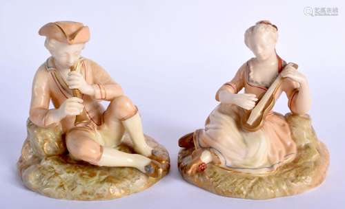 Royal Worcester blush ivory rare pair of figures of a boy an...