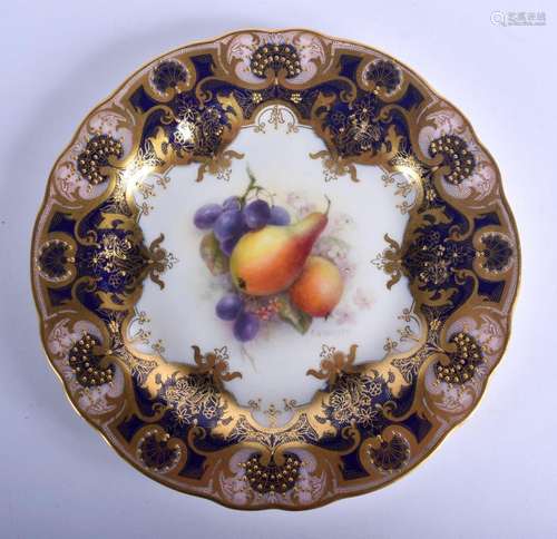 Royal Worcester plate finely painted with fruit under a blue...