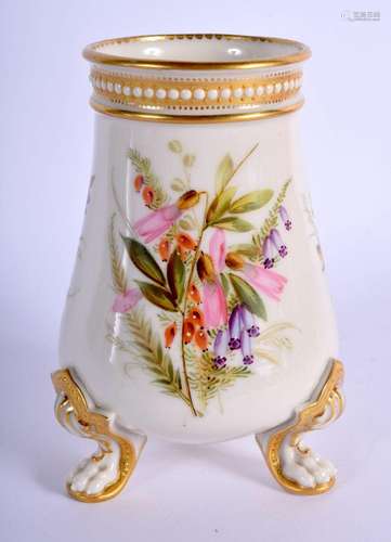 Royal Worcester three footed jewelled vase painted with flow...