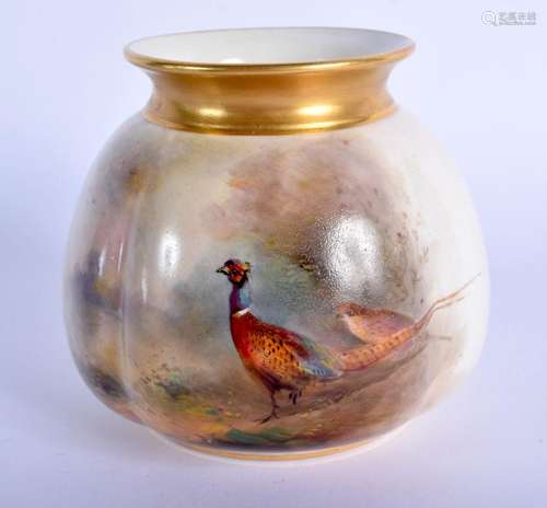 Royal Worcester vase of moulded spherical shape painted with...