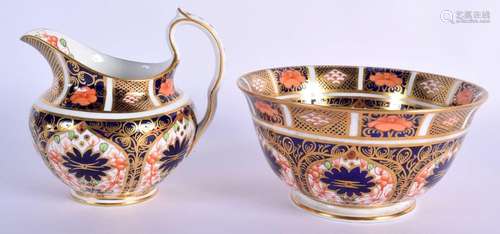 Royal Crown Derby cream jug painted in imari pattern 1128 da...