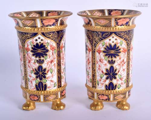 Royal Crown Derby pair of four footed spill vases painted in...