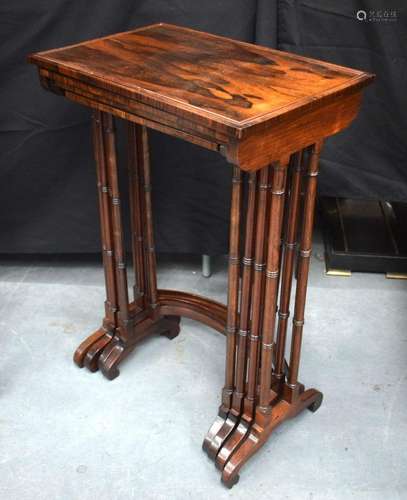 A RARE NEST OF FOUR VICTORIAN ROSEWOOD TABLES OF ELEGANT FOR...