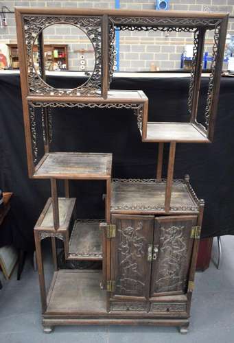 AN EARLY 20TH CENTURY CHINESE CARVED HARDWOOD DISPLAY CABINE...