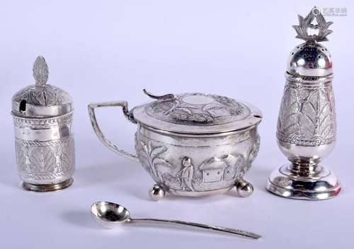 A VINTAGE INDIAN WHITE METAL CONDIMENT SET. White metal 118 ...