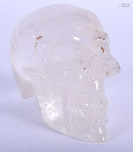 A CONTEMPORARY ROCK CRYSTAL SKULL. 8 cm x 6 cm.