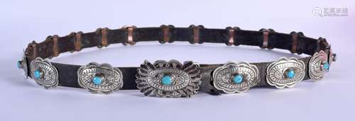 A LATE 19TH CENTURY MIDDLE EASTERN SILVER AND TURQUOISE BELT...