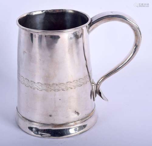 AN EARLY CONTINENTAL WHITE METAL TANKARD. 267 grams. 16 cm x...