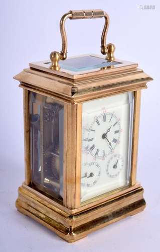 A CONTEMPORARY BRASS CARRIAGE CLOCK. 9.5 cm high inc handle.