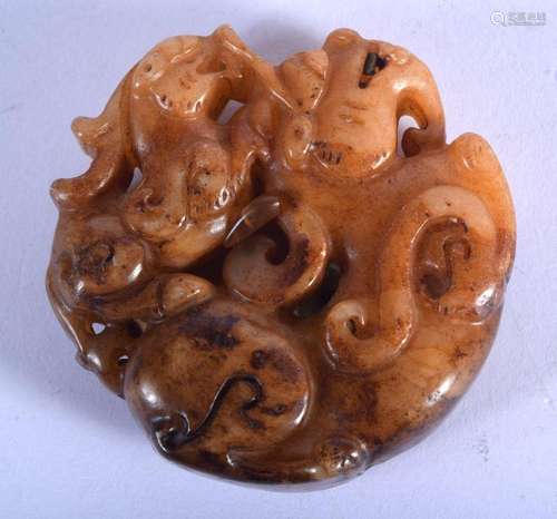 A CHINESE JADE BEAST ROUNDEL. 5 cm wide.