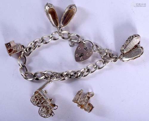 A VINTAGE SILVER CHARM BRACELET. Birmingham 1978. 34 grams. ...