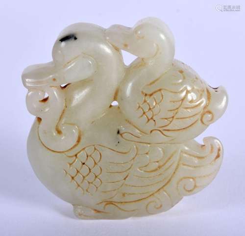 A CHINESE CARVED JADE DUCK ROUNDEL. 56 grams. 5 cm x 5 cm.