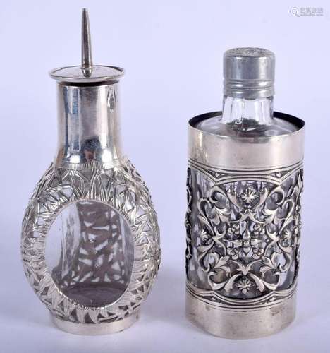 TWO SILVER MOUNTED SCENT BOTTLES. Birmingham 1900 & Ster...