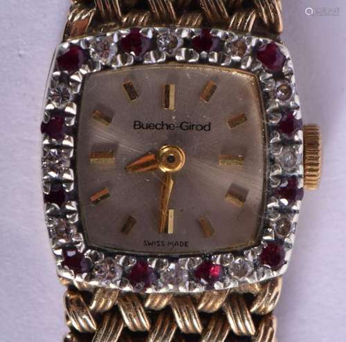 A 9CT GOLD DIAMOND AND RUBY BUECHE-GIROD WRISTWATCH. 37 gram...