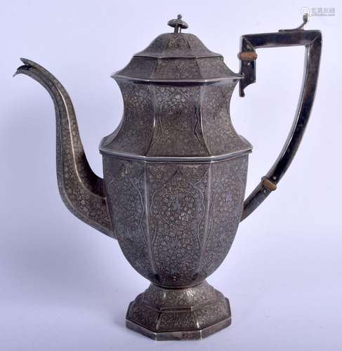 AN ANTIQUE INDIAN WHITE METAL COFFEE POT finely engraved wit...